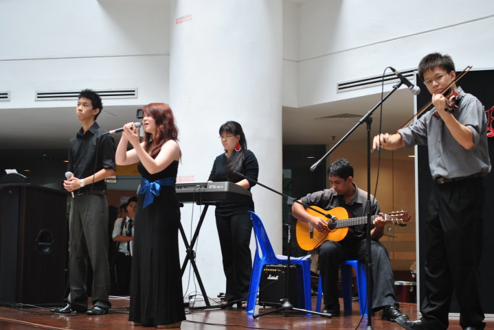 IMU Alumnus performing at IMU 