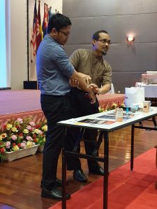 Anti-venom demonstration at a workshop attended by IMU students and their lecturer