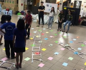 IMU conducted games like Human snake and ladders at Rumah Charis